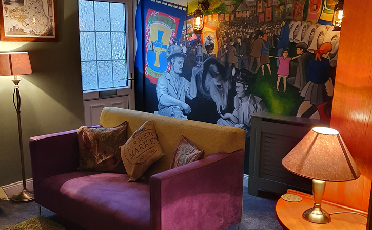 colourfully decorated living room at Harry's House